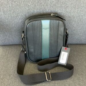 Brand new Ted Baker London Waydon
House Check PU Flight Bag, document bag.